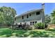 Well-manicured backyard featuring a wooden deck, perfect for outdoor entertaining and relaxation at 2625 Harbor Point Ct, Cumming, GA 30041
