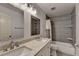 Bathroom boasts a double vanity, and a shower and tub combination at 2625 Harbor Point Ct, Cumming, GA 30041