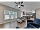 Open concept living room and kitchen area with lots of natural light and views of the backyard at 2625 Harbor Point Ct, Cumming, GA 30041