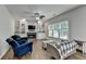 Comfortable living room featuring a fireplace, built-in shelving, and lots of natural light at 2625 Harbor Point Ct, Cumming, GA 30041