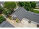 Aerial view showcases the home's well-maintained roof and spacious three-car garage at 3309 Raes Creek Rd # 13, Marietta, GA 30008