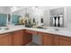 Bathroom featuring a double sink vanity, large mirror, and decorative accents at 3309 Raes Creek Rd # 13, Marietta, GA 30008