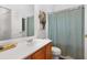 Bathroom with a single sink vanity, decorative shower curtain, and a patterned shower curtain at 3309 Raes Creek Rd # 13, Marietta, GA 30008