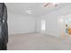 Neutral bedroom featuring a ceiling light, carpet floors, and access to a bathroom and another room at 3309 Raes Creek Rd # 13, Marietta, GA 30008