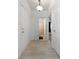 Hallway with a bathroom and bedroom in view, featuring light wood floors at 3309 Raes Creek Rd # 13, Marietta, GA 30008