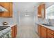 Bright kitchen featuring stainless appliances, white countertops, and an adjacent dining space at 3309 Raes Creek Rd # 13, Marietta, GA 30008