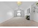 Bright and spacious living room with carpet, fireplace, and built-in shelving at 3309 Raes Creek Rd # 13, Marietta, GA 30008