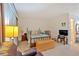 Cozy bedroom with natural light, side tables, and television at 4866 S Lilburn Stone Mountain Road Sw, Lilburn, GA 30047