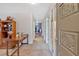 Entryway showcasing interior hallway and beautiful decorative doors and archways at 4866 S Lilburn Stone Mountain Road Sw, Lilburn, GA 30047