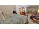 This spacious bedroom includes a mirrored closet, sitting area, and an ensuite bathroom at 4866 S Lilburn Stone Mountain Road Sw Rd, Lilburn, GA 30047