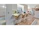 Eat-in bar highlights this kitchen with stainless appliances, lots of counter space, and backyard views at 4866 S Lilburn Stone Mountain Road Sw Rd, Lilburn, GA 30047