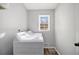 Practical laundry area with modern appliances and clean lines at 6492 Swift Creek Road, Lithonia, GA 30058