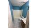 Bathroom featuring a shower-tub combo, a sink with a vanity, and tiled floors at 1 Thorntree Pass, Powder Springs, GA 30127