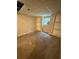 Spacious room featuring built-in shelving, carpeted floors, and a window at 1 Thorntree Pass, Powder Springs, GA 30127