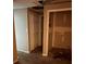 Hallway with access to closet and utility room with washer and dryer hookups at 1 Thorntree Pass, Powder Springs, GA 30127