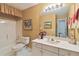 Functional bathroom with a shower-tub combo, a single sink vanity, and essential fixtures at 10050 Lauren Hall Ct, Alpharetta, GA 30022