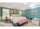 Charming bedroom featuring a plush bed, soft lighting, and elegant decor for a cozy retreat at 10050 Lauren Hall Ct, Alpharetta, GA 30022