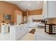 Bright kitchen with white cabinets, central island, and modern appliances at 10050 Lauren Hall Ct, Alpharetta, GA 30022