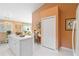 Bright kitchen with a central island, breakfast nook, and white appliances at 10050 Lauren Hall Ct, Alpharetta, GA 30022