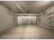 Spacious two car garage featuring ample room for vehicles and storage at 2838 Menton Rd, Powder Springs, GA 30127