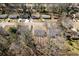 A high-angle shot of several residential properties with bare winter trees interspersed among the homes at 4558 Ryan Rd, Conley, GA 30288