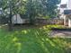 Backyard with shed and large trees at 5942 Idlewood Pl, Lithonia, GA 30038