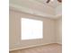 Bedroom features neutral walls and carpet, with a tray ceiling and ceiling fan at 5942 Idlewood Pl, Lithonia, GA 30038