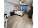 Comfortable bedroom with a queen-size bed, ceiling fan, and neutral decor at 1447 Evanston, Marietta, GA 30062