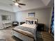 Comfortable bedroom with a queen-size bed, ceiling fan, and neutral decor at 1447 Evanston, Marietta, GA 30062