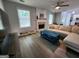 Bright living room featuring hardwood floors, fireplace, and ample natural light at 1447 Evanston, Marietta, GA 30062