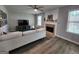 Bright living room featuring hardwood floors, fireplace, and ample natural light at 1447 Evanston, Marietta, GA 30062