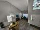 Light-filled living room boasts vaulted ceilings and a view of the front entry at 1447 Evanston, Marietta, GA 30062
