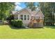 Lush backyard featuring a wooden deck that is great for entertaining and enjoying the outdoors at 15 Miners Pt Se, Acworth, GA 30102