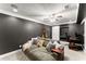 Basement lounge area, with mounted guitars on wall at 15 Miners Pt Se, Acworth, GA 30102