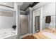 Bathroom featuring a soaking tub, shower, and granite countertop at 15 Miners Pt Se, Acworth, GA 30102