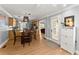 Eat-in kitchen features a dining table and easy access to the kitchen and backyard at 15 Miners Pt Se, Acworth, GA 30102