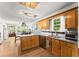 Bright kitchen featuring a stainless steel dishwasher, sink, and lots of cabinet storage at 15 Miners Pt Se, Acworth, GA 30102