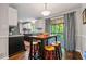 View of kitchen/dining area with hardwood floors and lots of light at 2136 N Landing Way, Marietta, GA 30066