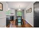 A cozy dining area adjacent to the kitchen with hardwood floors at 2136 N Landing Way, Marietta, GA 30066
