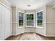 Bedroom with multiple windows creating a well-lit space at 268 Heathrow Dr, Riverdale, GA 30274
