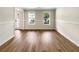 Bright dining room with plenty of natural light and updated flooring at 268 Heathrow Dr, Riverdale, GA 30274