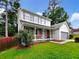 Charming two-story home with covered porch and well-maintained landscaping at 268 Heathrow Dr, Riverdale, GA 30274