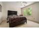 Relaxing bedroom with a queen bed and view of the trees outside at 2695 Moon Cabin Dr, Powder Springs, GA 30127