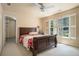 This bedroom offers plenty of natural light and space, with a view of the backyard at 2695 Moon Cabin Dr, Powder Springs, GA 30127