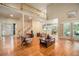 Open-concept living room featuring hardwood floors and plenty of natural light at 2695 Moon Cabin Dr, Powder Springs, GA 30127