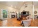 Living room featuring a fireplace, hardwood floors, and natural light at 2695 Moon Cabin Dr, Powder Springs, GA 30127