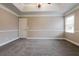 Clean and bright bedroom with gray carpet and freshly painted walls at 2082 Blackberry Ln, Auburn, GA 30011