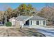 Charming home with a brick and siding exterior, complemented by a well-maintained lawn at 2082 Blackberry Ln, Auburn, GA 30011