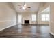 Living room area with fireplace and dark wood floors at 2082 Blackberry Ln, Auburn, GA 30011