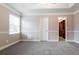 Bright and spacious main bedroom with a walk-in closet and neutral decor at 2082 Blackberry Ln, Auburn, GA 30011